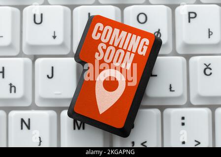 Hand writing sign Coming Soon. Internet Concept something is going to happen in really short time of period Stock Photo