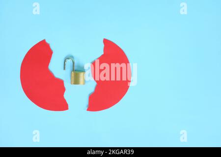 Data breach and information theft concept. Creative composition of broken security padlock. Stock Photo