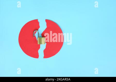 Data breach and information theft concept. Creative composition of broken security padlock. Stock Photo