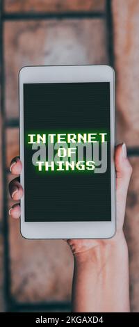 Hand writing sign Internet Of Things. Business idea Innovation Globalization Digital Electronics Connectivity Stock Photo
