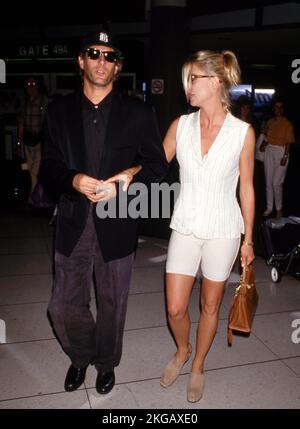 Michael Bolton and Nicollette Sheridan at LAX September 1993 Credit