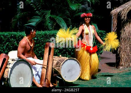 Dancer and drummer at historic Kodak Hula Show, Honolulu, Oahu, Hawaii, USA, North America Stock Photo