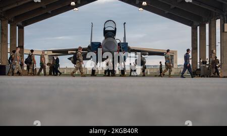 Airmen from the 44th Aircraft Maintenance Unit load AIM-9 Sidewinder ...