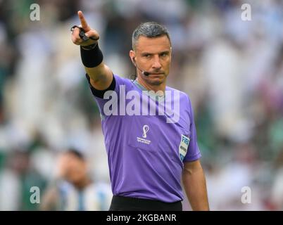 Lusail, Qatar. 22nd Nov, 2022. Soccer: World Cup, Argentina - Saudi Arabia, preliminary round, Group C, Matchday 1, Lusail Iconic Stadium, referee Slavko Vincic gesticulates. Credit: Robert Michael/dpa/Alamy Live News Stock Photo