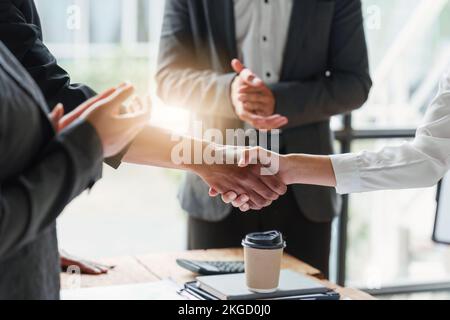 Business partnership meeting concept. Image businessmans handshake. Successful businessmen handshaking after good deal. Group support concept Stock Photo