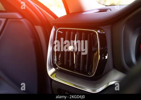 the grille of the air deflector of a modern car close up. Stock Photo