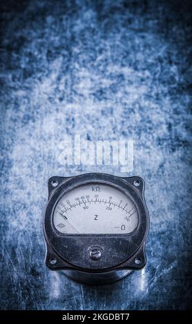 Ammeter on metallic surface electricity concept. Stock Photo