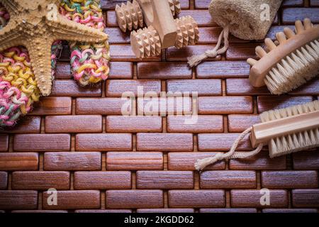 Big relaxation set on textured wooden table mat healthcare concept. Stock Photo