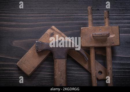 Claw Ruler Set of vintage claw hammer square ruler and surface gage Stock Photo ...