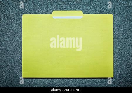 Office folder with paper on black background. Stock Photo
