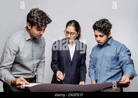 Engineering Team Collaborating on a Project for Innovative Solutions and Technical Development, Problem Solving, and Technical Challenge at Workplace. Stock Photo