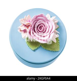 Round blue present box isolated on white. Stock Photo