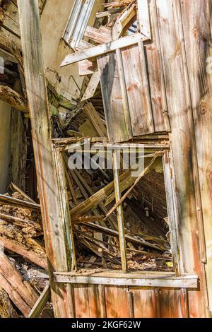 Old window on a ruined cottage Stock Photo