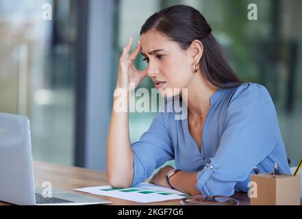 Business woman, laptop and stress with headache from work anxiety or technical problems at the office. Female employee analyst suffering from burnout Stock Photo
