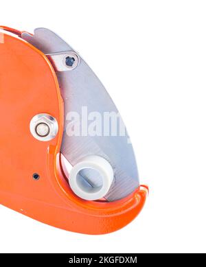 very close up view on pipe cutter with plastical pipe isolated Stock Photo