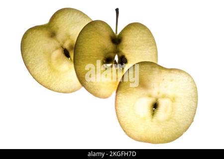 apple slices lit from the back on a trasparent background Stock Photo