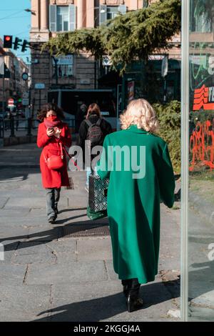 A vertical shot of the people walking around in Genoa, Italy Stock Photo