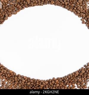 Circle frame of coffee beans isolated on white background, example for advertising, free space for inscription. Stock Photo