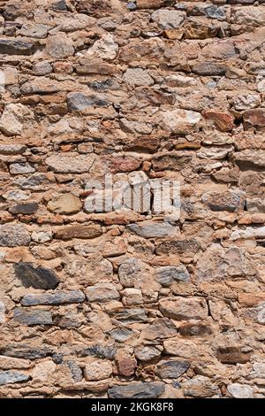 Vertical shot of stone tiles wall, background, texture, pattern. Stock Photo