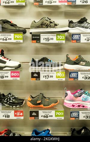Epsom, Surrey, London UK, November 20 2022, Shop Display Of Trainers Or Sports Fashion Shoes With No People Stock Photo