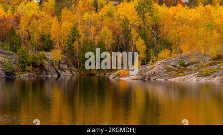 Autumn reflections in Simon Lake, Greater Sudbury, Ontario, Canada Stock Photo