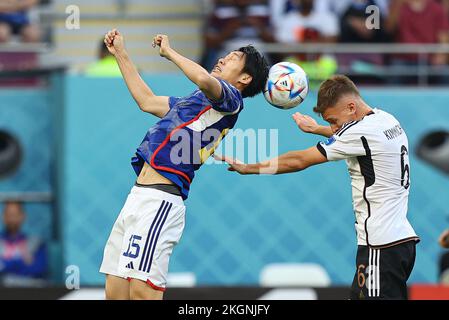 Ar Rajjan, Qatar. 23rd Nov, 2022. Daichi Kamada, Joshua Kimmich during the FIFA World Cup Qatar 2022 Group E match between Germany and Japan at Khalifa International Stadium on November 23, 2022 in Ar-Rajjan, Qatar. (Photo by Pawel Andrachiewicz/PressFocus/Sipa USA) Credit: Sipa USA/Alamy Live News Stock Photo