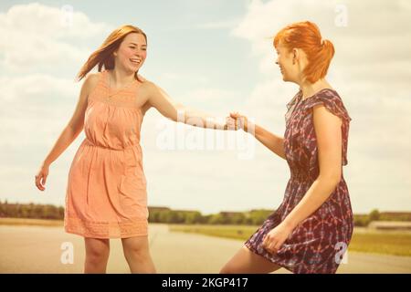 Two young women having fun together Stock Photo