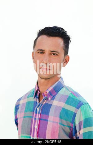 Man in shirt against white background Stock Photo