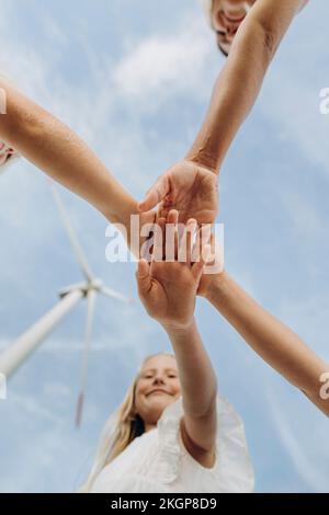 happy children playing and stacking hands at park Stock Photo - Alamy