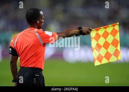 An assistant referee signals offside during the FIFA World Cup Group E match at the Khalifa International Stadium, Doha. Picture date: Wednesday November 23, 2022. Stock Photo