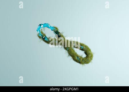 Three dimensional render of infinity symbol made of grass and water Stock Photo