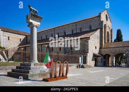 Italy, Friuli Venezia Giulia, Aquileia, Monument in front of Basilica di Santa Maria Assunta Stock Photo