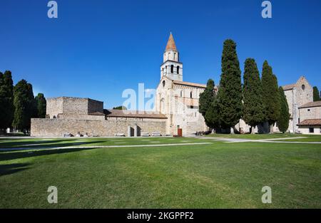 Italy, Friuli Venezia Giulia, Aquileia, Lawn in front of Basilica di Santa Maria Assunta Stock Photo