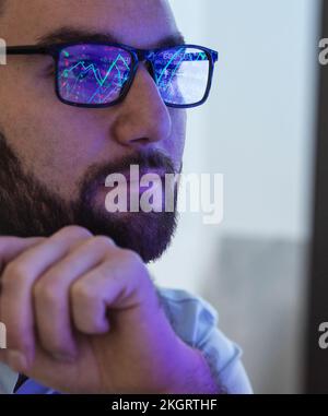 Trader analyzing stock market data Stock Photo