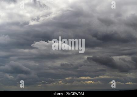 Dark clouds in a stormy sky. Stock Photo