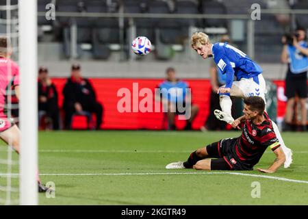 Sydney, Australia. 23rd Nov, 2022. SYDNEY, AUSTRALIA - NOVEMBER 23: Tomislav Mrcela of Wanderers falls attempting to block the kick from Anthony Gordon of Everton FC during the match between Everton and Wanderers at CommBank Stadium Credit: IOIO IMAGES/Alamy Live News Stock Photo