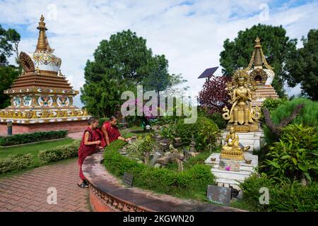 Young monks in the courtyard of the Tibetan Buddhist monastery of Kopan. Kathmandu. Nepal. Stock Photo