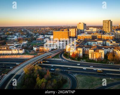 An aerial cityscape view in New Brunswick, New Jersey with Rutgers University during sunrise Stock Photo