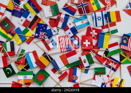 Small toothpick maps of many different countries on a white background. Stock Photo