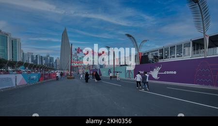 Doha corniche  sunset shot showing Qatar preparation for FIFA World cup Qatar 2022 with locals and visitors walking on the promenade Stock Photo