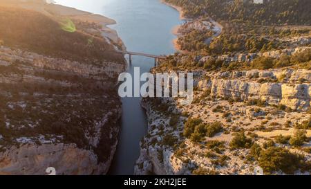 Aerial view of the Pont du Galetas at the limit of the Gorges du Verdon and Lac de Sainte-Croix in Aiguines. Stock Photo