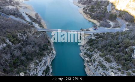 Aerial view of the Pont du Galetas at the limit of the Gorges du Verdon and Lac de Sainte-Croix in Aiguines. Stock Photo