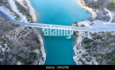 Aerial view of the Pont du Galetas at the limit of the Gorges du Verdon and Lac de Sainte-Croix in Aiguines. Stock Photo