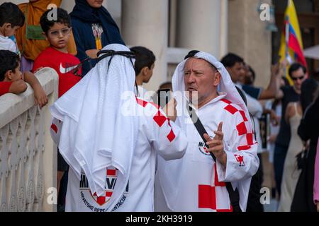 FIFA World Cup Croatia Fans in Qatari look Dress enjoying in Souq Waqif Stock Photo