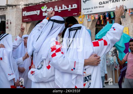 FIFA World Cup Croatia Fans in Qatari look Dress enjoying in Souq Waqif Stock Photo
