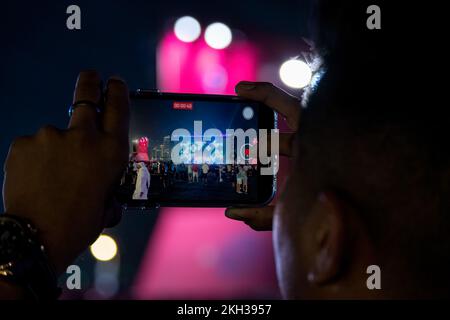 Citizens of different countries FIFA World Cup Football Qatar 2022 Celebrating and watching opening ceremony in fan Festival zone Stock Photo