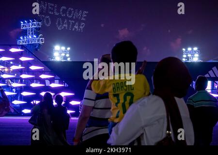 Citizens of different countries FIFA World Cup Football Qatar 2022 Celebrating and watching opening ceremony in fan Festival zone Stock Photo