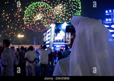 Citizens of different countries FIFA World Cup Football Qatar 2022 Celebrating and watching opening ceremony in fan Festival zone Stock Photo