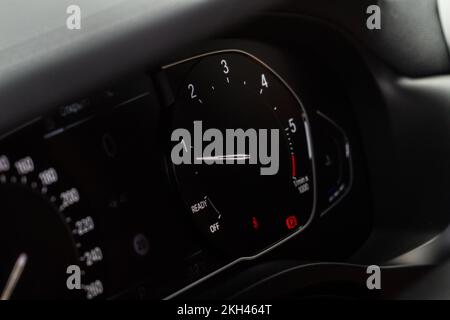 Modern car dashboard with speedometer, tachometer. Car dashboard. Car dashboard details. Modern car interior. The speedometer of a modern Stock Photo