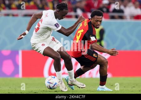 Al Rayyan, Qatar. 23rd Nov, 2022. Canadian Ismael Kone and Belgium's Lois Openda pictured in action during a soccer game between Belgium's national team the Red Devils and Canada, in Group F of the FIFA 2022 World Cup in Al Rayyan, State of Qatar on Wednesday 23 November 2022. BELGA PHOTO BRUNO FAHY Credit: Belga News Agency/Alamy Live News Stock Photo